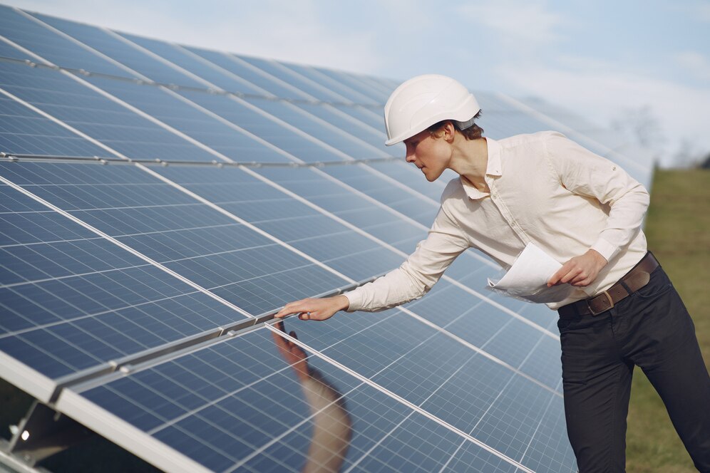 Picture of business man checking solar panels