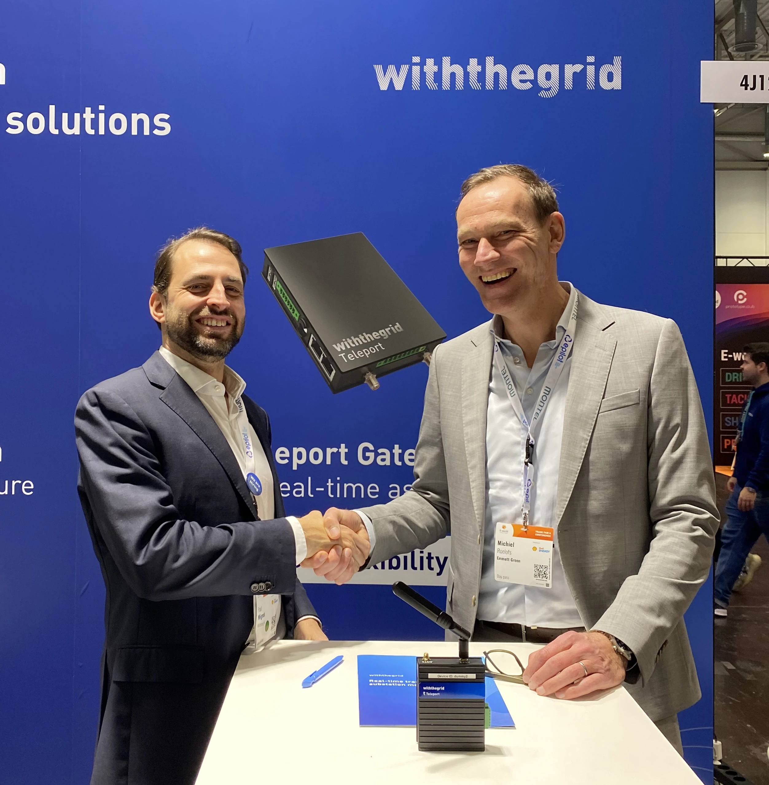Emmett Green and Withthegrid handshake at E-World Essen
